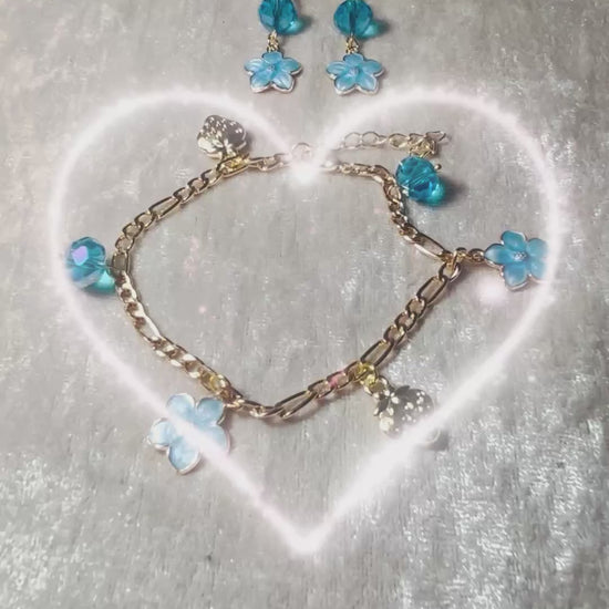 Bracelet et boucles d’oreilles avec fleurs bleues en émail et perles, bleu turquoise à facettes sur acier inoxydable